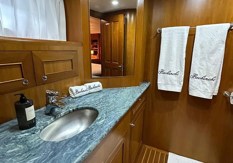 Bochinche Yacht Photos Pics Luxurious bathroom in 2006 Grand Alaskan 65 Flush Deck yacht with marble countertop.