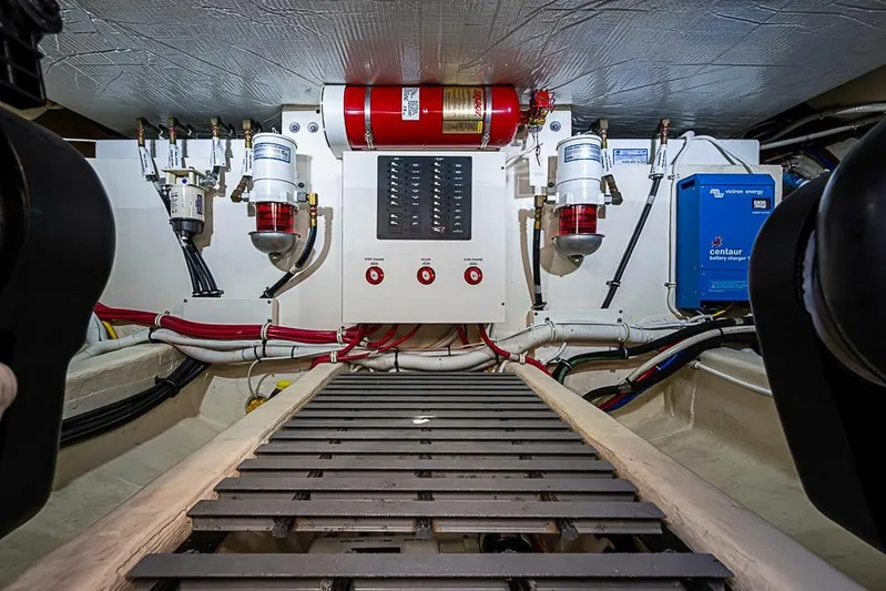 Polaris Yacht Photos Pics Engine room of 2018 Tiara Yachts C39 Coupe with fire suppression system and battery charger.