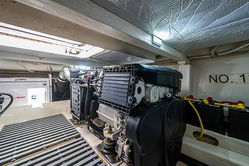 Polaris Yacht Photos Pics Engine room of 2018 Tiara Yachts C39 Coupe, featuring Volvo Penta engine and Cummins Onan generator.