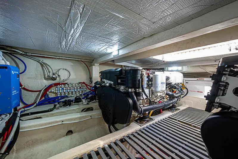 Polaris Yacht Photos Pics Engine room of 2018 Tiara Yachts C39 Coupe, featuring Cummins Onan generator and wiring.