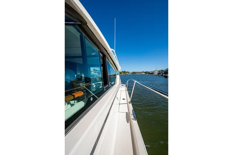 Polaris Yacht Photos Pics 2018 Tiara Yachts C39 Coupe on water, showcasing sleek design and scenic view.