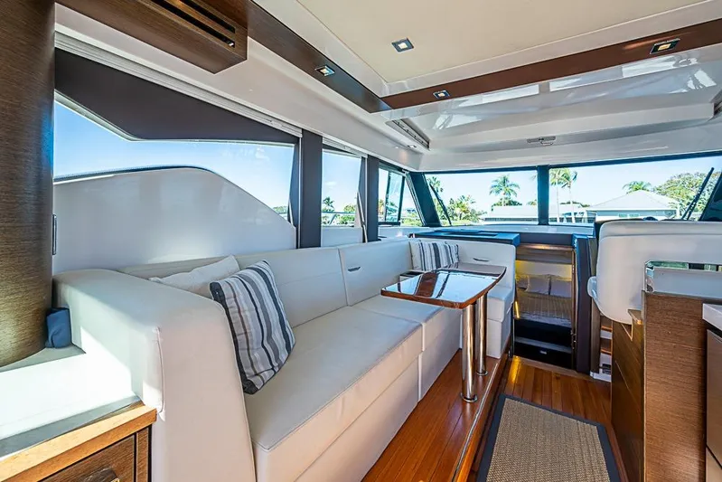 Polaris Yacht Photos Pics Luxurious interior of 2018 Tiara Yachts C39 Coupe with elegant seating and modern design.