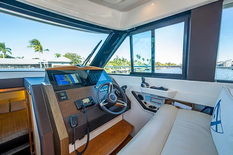 Polaris Yacht Photos Pics 2018 Tiara Yachts C39 Coupe helm with modern navigation system and luxurious interior.
