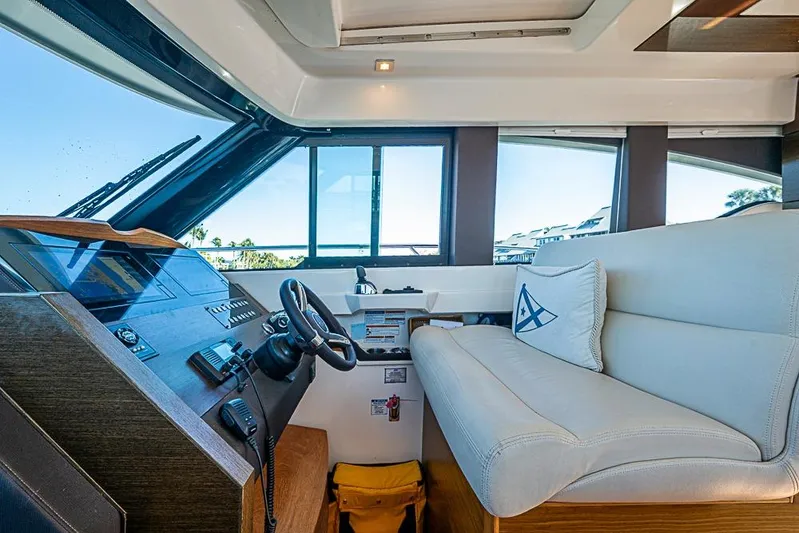 Polaris Yacht Photos Pics 2018 Tiara Yachts C39 Coupe interior with helm and seating area.