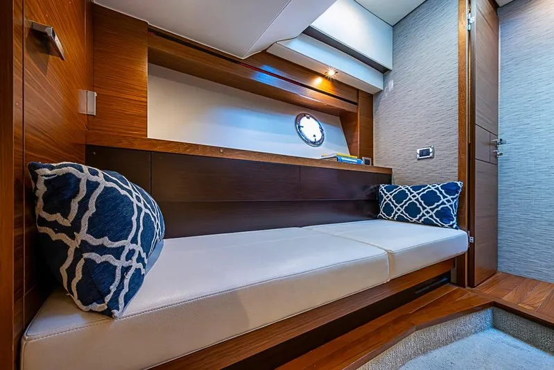 Polaris Yacht Photos Pics Luxurious interior of 2018 Tiara Yachts C39 Coupe with elegant seating and nautical decor.