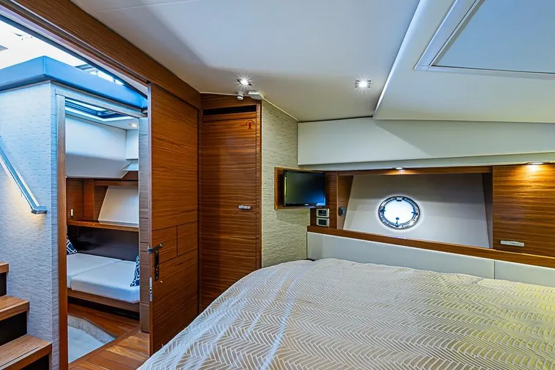 Polaris Yacht Photos Pics Luxurious interior of 2018 Tiara Yachts C39 Coupe with wood accents and modern amenities.