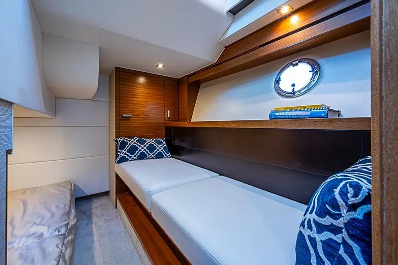 Polaris Yacht Photos Pics Luxurious interior cabin of 2018 Tiara Yachts C39 Coupe with cozy bedding.