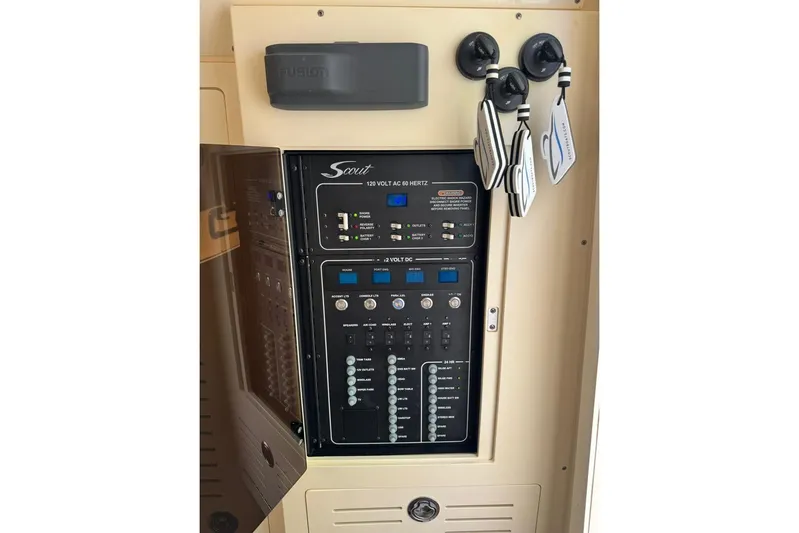  Yacht Photos Pics Electrical control panel on 2020 Scout 355 LXF boat, featuring switches and gauges.