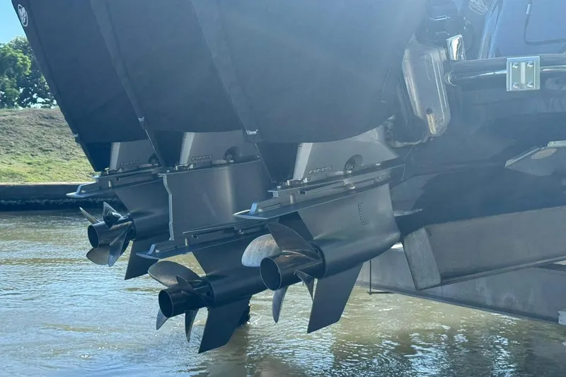  Yacht Photos Pics 2020 Scout 355 LXF boat engines and propellers in water.