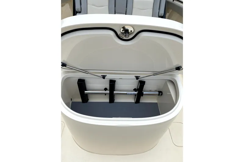  Yacht Photos Pics 2020 Scout 355 LXF boat storage compartment with open lid and hydraulic support.