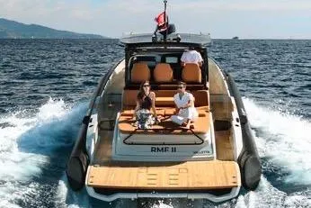 Rmf Yacht Photos Pics 2022 SACS Rebel 47 luxury yacht cruising on open water.