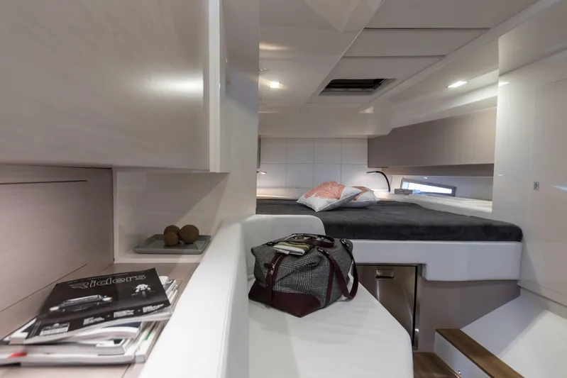 Rmf Yacht Photos Pics Interior of 2022 SACS Rebel 47 yacht, featuring modern design and comfortable sleeping area.