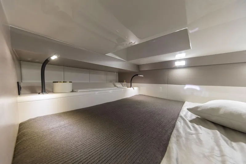 Rmf Yacht Photos Pics Luxurious interior cabin of 2022 SACS Rebel 47 yacht with modern lighting.