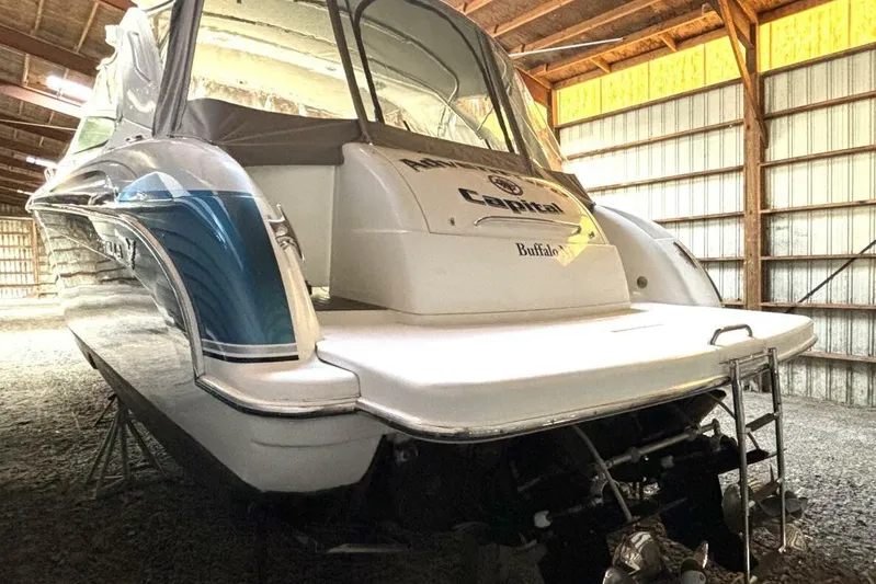  Yacht Photos Pics 2006 Formula 400 Super Sport Crossover boat in storage, rear view, indoors.