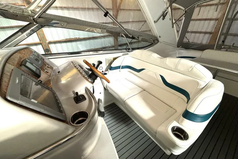  Yacht Photos Pics Interior of 2006 Formula 400 Super Sport Crossover with white seating and modern dashboard.