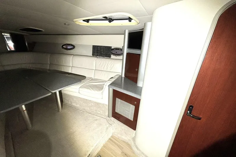  Yacht Photos Pics Interior of 2006 Formula 400 Super Sport Crossover with seating and table.