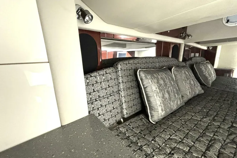  Yacht Photos Pics Luxurious interior of 2006 Formula 400 Super Sport Crossover with patterned cushions and elegant decor.