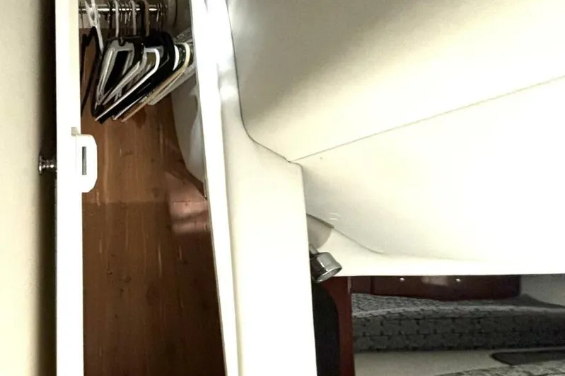  Yacht Photos Pics Interior view of a 2006 Formula 400 Super Sport Crossover with closet and hangers.