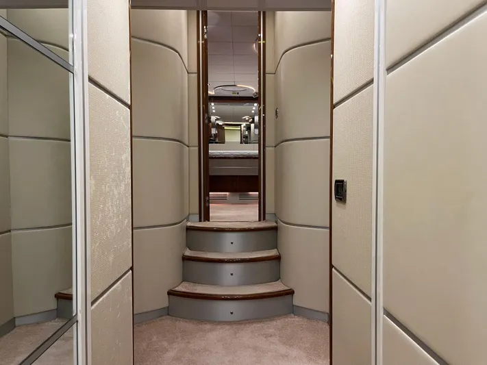 Nike Yacht Photos Pics Luxurious interior of 2007 Dominator 860 yacht with elegant staircase and modern design.