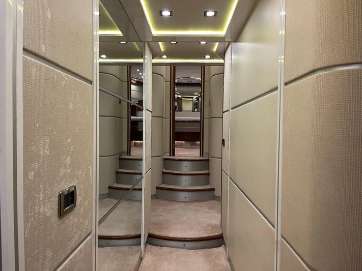 Nike Yacht Photos Pics Luxurious interior hallway of 2007 Dominator 860 yacht with modern lighting and elegant design.