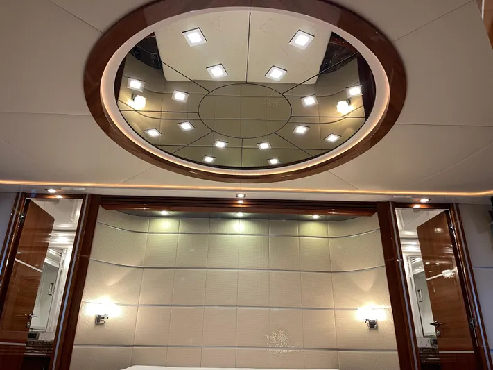 Nike Yacht Photos Pics Luxurious interior of 2007 Dominator 860 yacht with elegant lighting and wood accents.