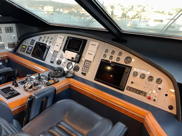 Nike Yacht Photos Pics Cockpit of 2007 Dominator 860 yacht with advanced navigation controls and displays.