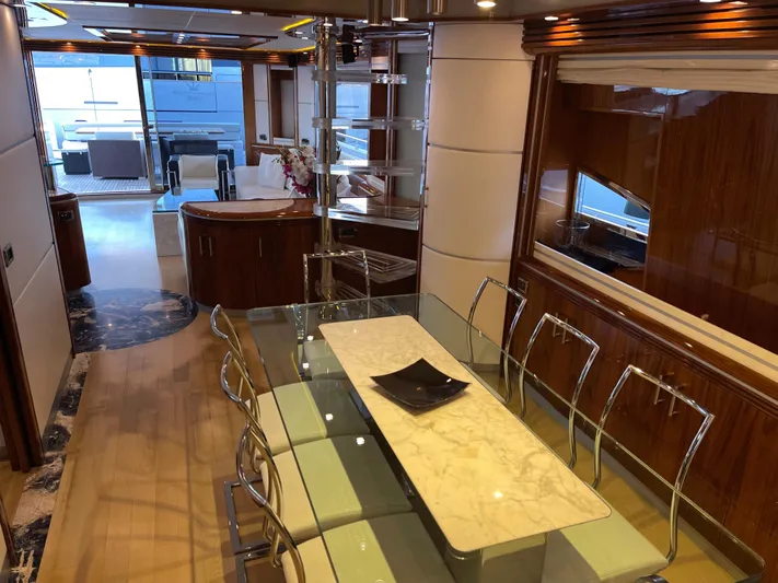 Nike Yacht Photos Pics Luxurious interior of 2007 Dominator 860 yacht with elegant dining area and modern design.