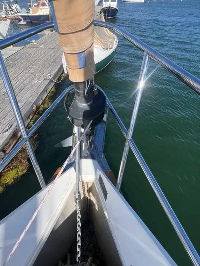  Yacht Photos Pics Bow of 2003 Tartan 4100 sailboat docked, showing anchor and railing.