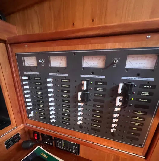  Yacht Photos Pics Control panel of a 2003 Tartan 4100 yacht with switches and meters.