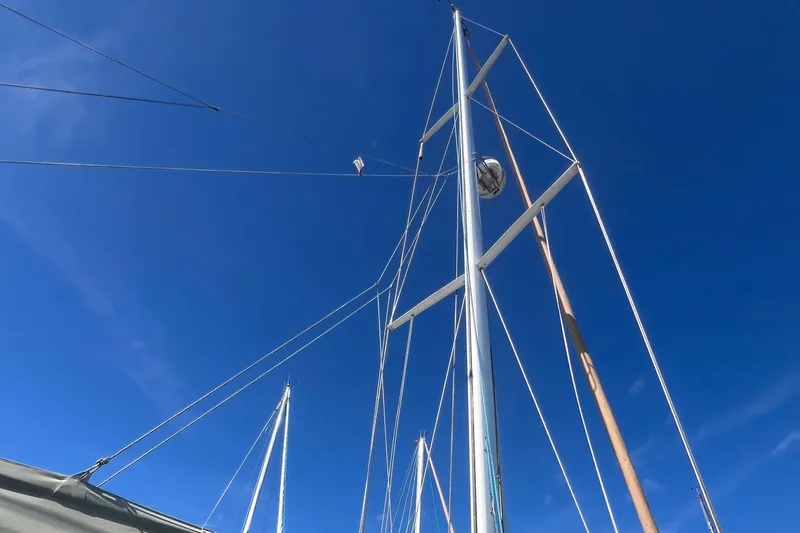  Yacht Photos Pics Sailboat mast against clear blue sky, Tartan 4100, 2003 model.