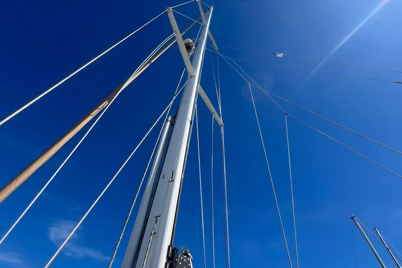  Yacht Photos Pics Sailboat mast against clear blue sky, Tartan 4100, 2003 model.