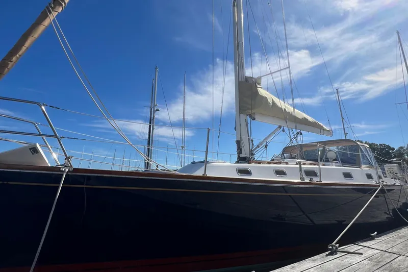  Yacht Photos Pics Sailboat Tartan 4100, 2003 model, docked under a clear blue sky.