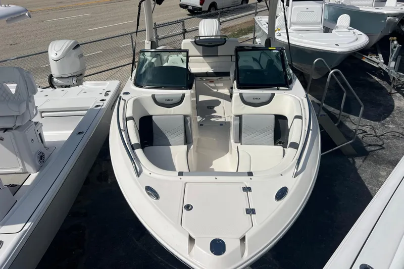  Yacht Photos Pics 2025 Chaparral 270 OSX boat with sleek design and spacious seating.