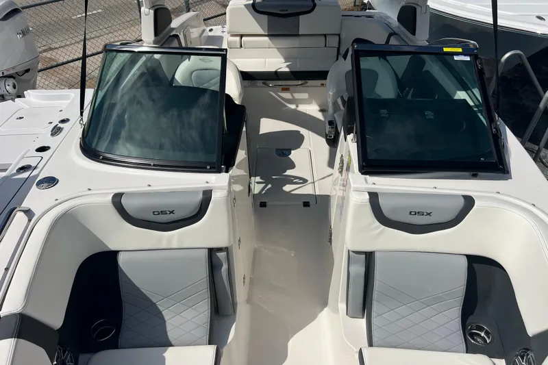  Yacht Photos Pics 2025 Chaparral 270 OSX boat interior with sleek seating and modern design.