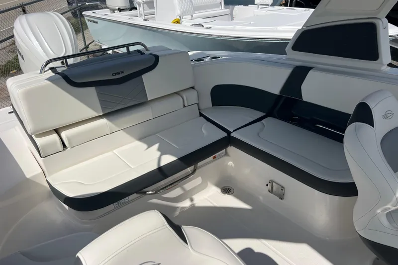  Yacht Photos Pics 2025 Chaparral 270 OSX boat interior with luxurious seating and modern design.