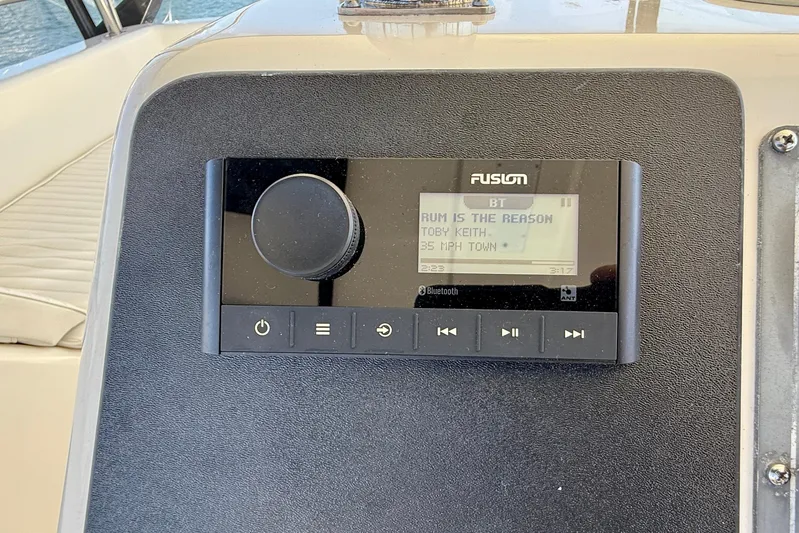 Seafood (reserved) Yacht Photos Pics Fusion stereo system on 1998 Riviera 43 Open Flybridge, playing Toby Keith's "Rum is the Reason."