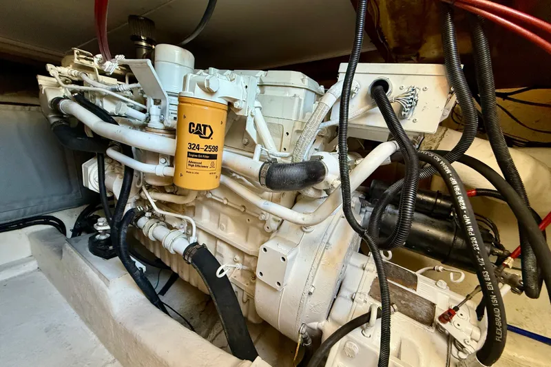 Seafood (reserved) Yacht Photos Pics Engine compartment of 1998 Riviera 43 Open Flybridge with CAT engine filter.