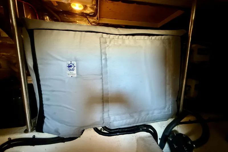 Seafood (reserved) Yacht Photos Pics Engine room of 1998 Riviera 43 Open Flybridge with insulated cover and lighting.