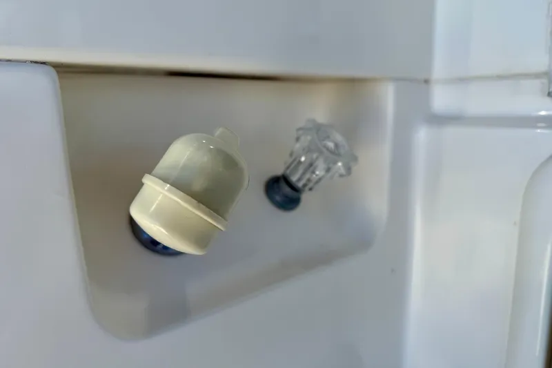 Seafood (reserved) Yacht Photos Pics Close-up of a 1998 Riviera 43 Open Flybridge boat's control knobs.