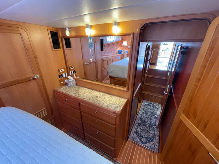 Sherlock Holmes Yacht Photos Pics Luxurious 2016 Kadey-Krogen 44E yacht interior with wooden cabinetry and elegant lighting.