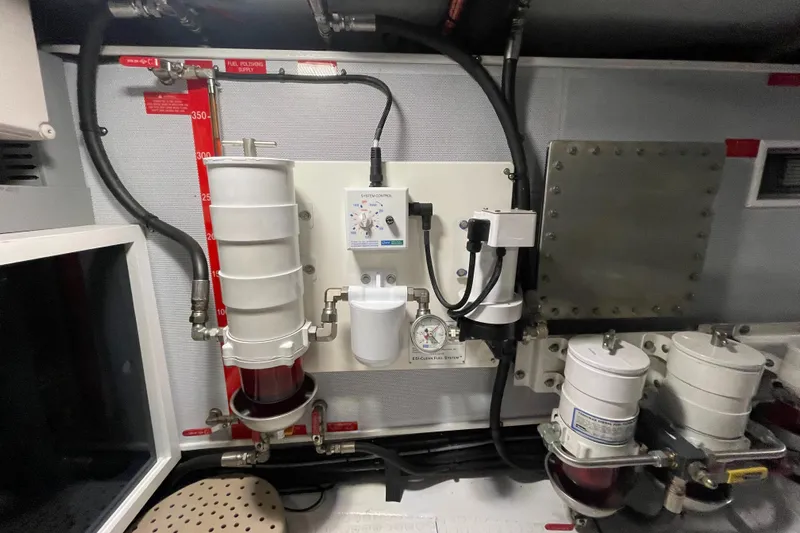 Sherlock Holmes Yacht Photos Pics Engine room of 2016 Kadey-Krogen 44E with fuel filtration system and control panel.