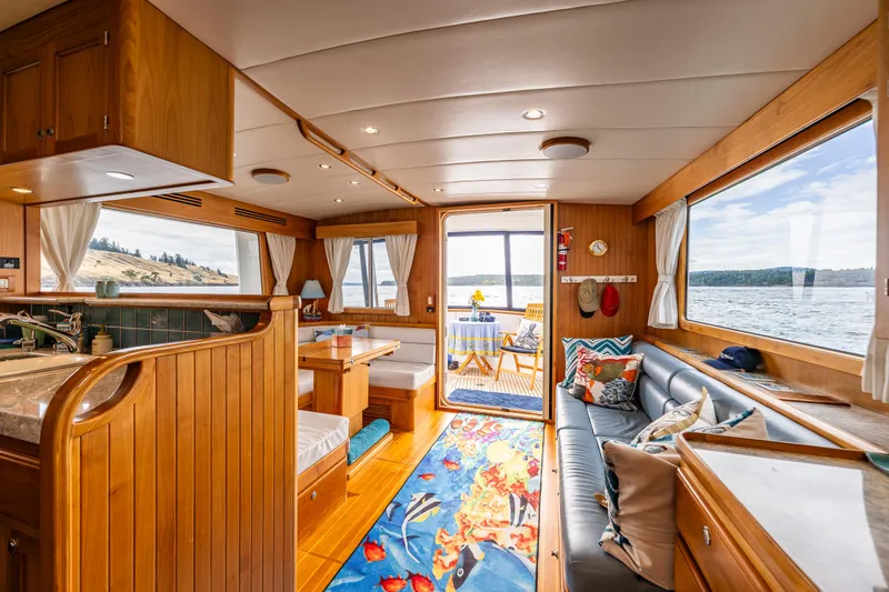 Sherlock Holmes Yacht Photos Pics Luxurious 2016 Kadey-Krogen 44E yacht interior with wood finishes and ocean views.