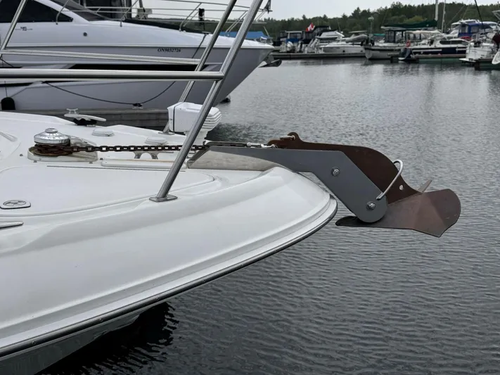  Yacht Photos Pics Bow of 2001 Sea Ray 410 Express Cruiser with anchor, docked in marina.