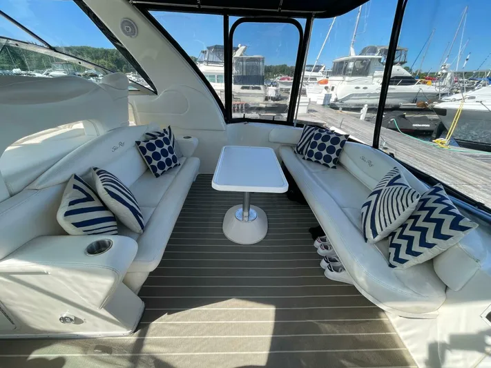  Yacht Photos Pics Luxurious 2001 Sea Ray 410 Express Cruiser interior with plush seating and nautical decor.