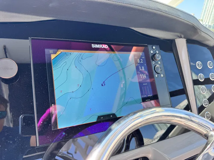  Yacht Photos Pics Simrad navigation display on 2021 Robalo R317 Dual Console boat dashboard.
