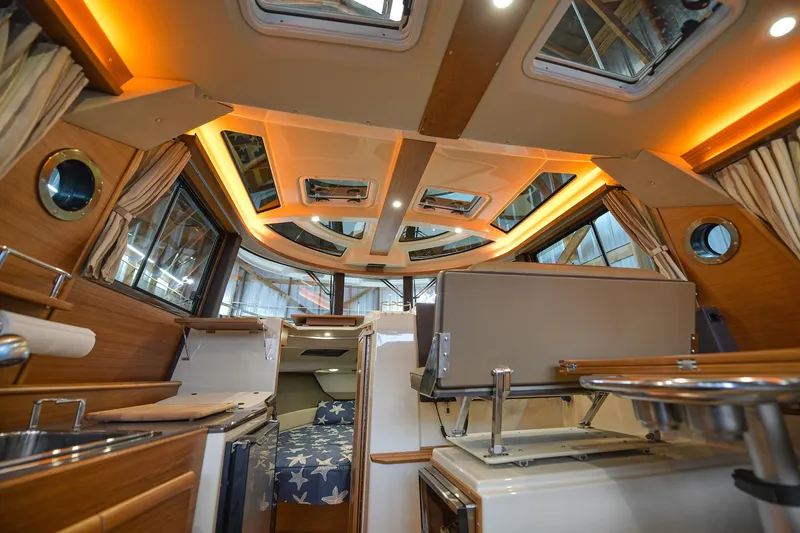 Celtic Mist Yacht Photos Pics Interior of 2023 Ranger Tugs R-29S boat with modern design and ambient lighting.
