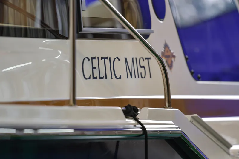 Celtic Mist Yacht Photos Pics 2023 Ranger Tugs R-29S boat named "Celtic Mist" with sleek design details.