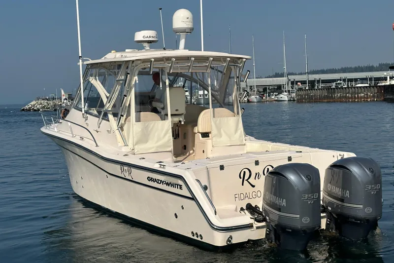R & R Yacht Photos Pics 2008 Grady White Express boat with twin Yamaha 350 engines in a marina setting.