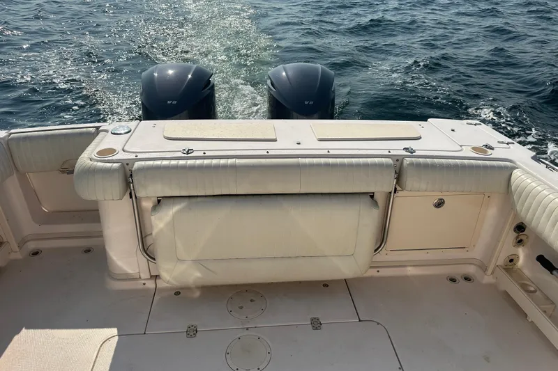 R & R Yacht Photos Pics 2008 Grady White Express boat with dual engines on open water.