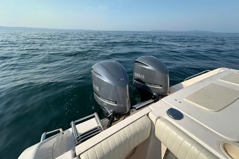 R & R Yacht Photos Pics 2008 Grady White Express boat with twin Yamaha outboard motors on open water.